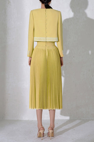 draped top pleat skirt set in yellow