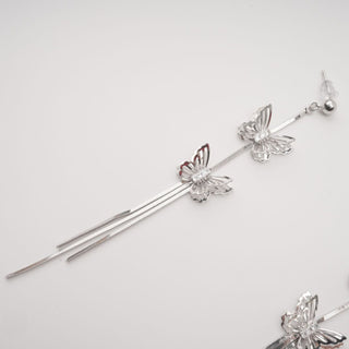 Bella silver butterfly drop earrings