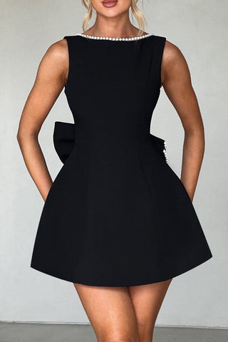 TRISTA BOWKNOT PEARL BACKLESS MINI DRESS IN BLACK