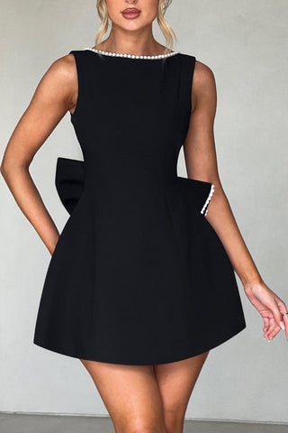 TRISTA BOWKNOT PEARL BACKLESS MINI DRESS IN BLACK