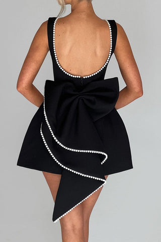 TRISTA BOWKNOT PEARL BACKLESS MINI DRESS IN BLACK