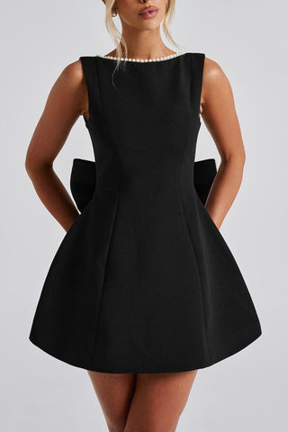 TRISTA BOWKNOT PEARL BACKLESS MINI DRESS IN BLACK